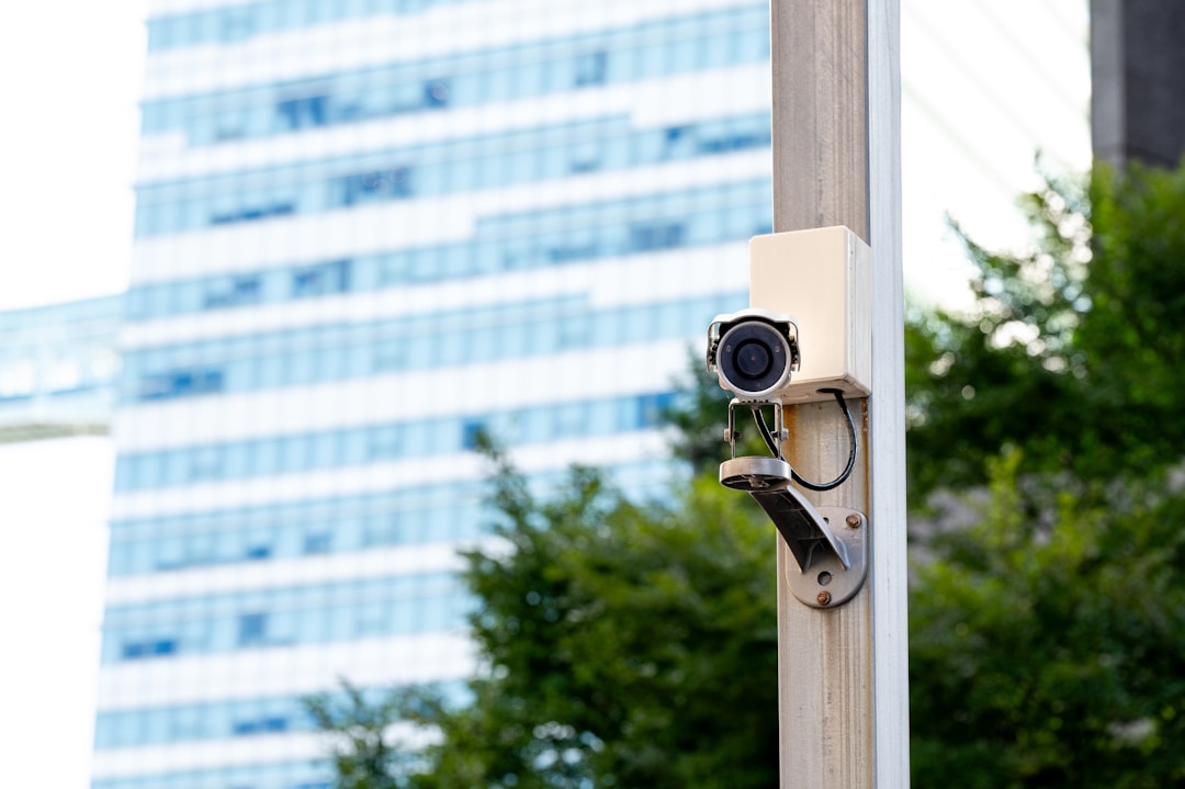 Security camera system mounted on commercial building