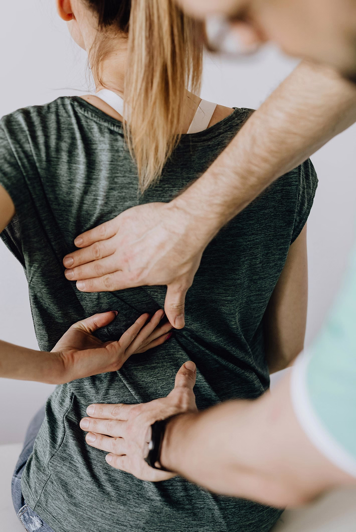 crop-orthopedist-examining-back