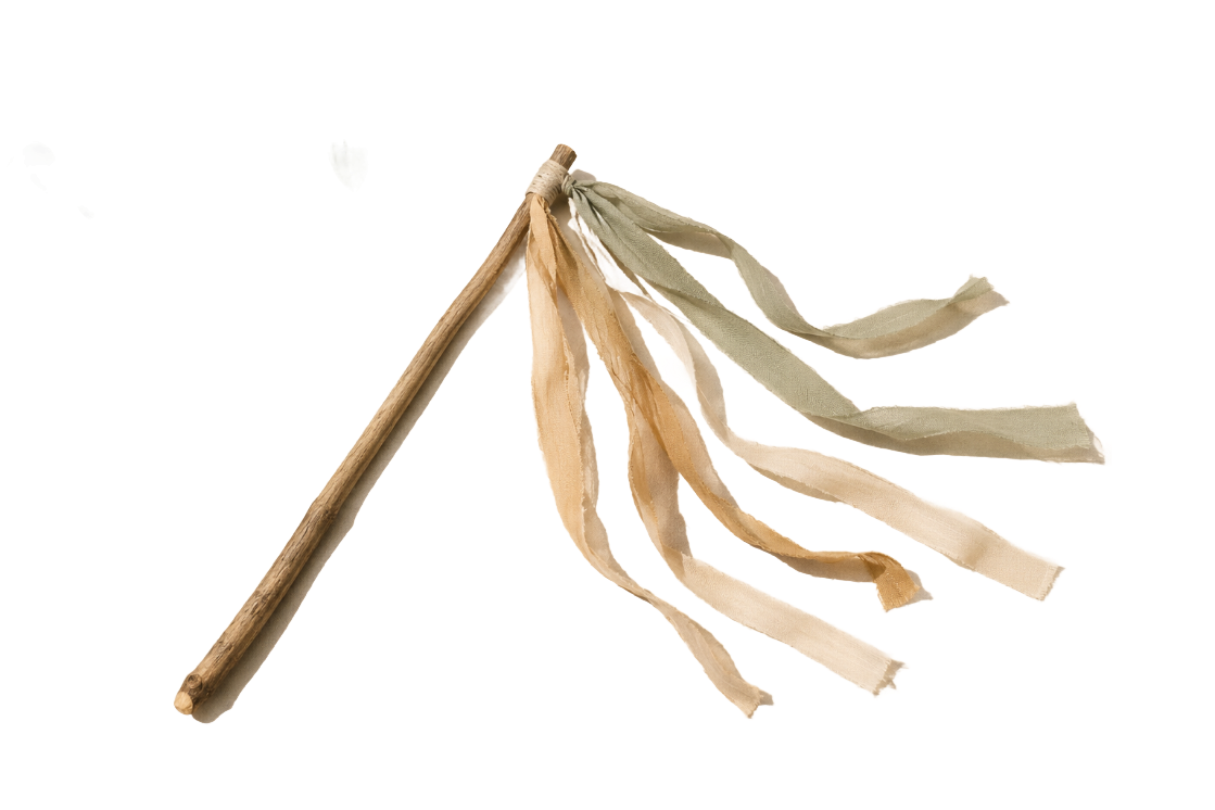 A simple wind streamer made from a stick with soft ribbons