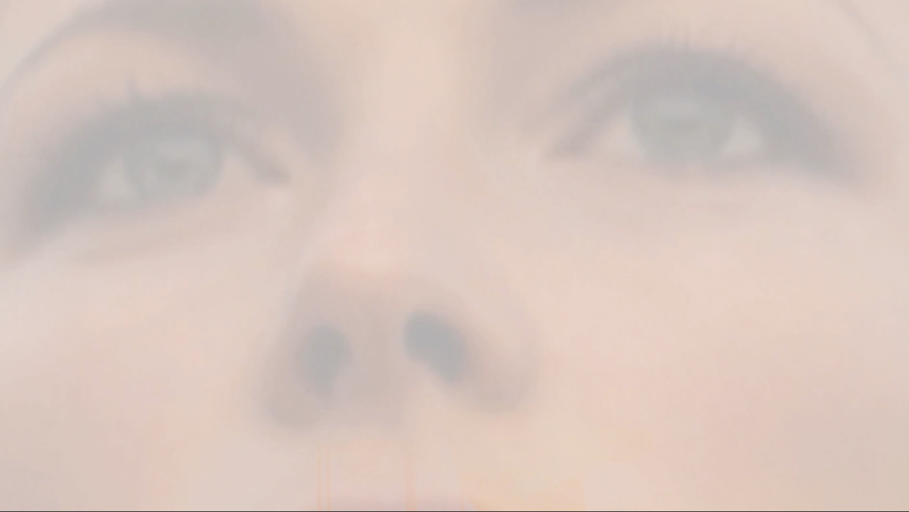 Extreme close up of girls eyes still image from a music video inspired by the film 12 Monkeys