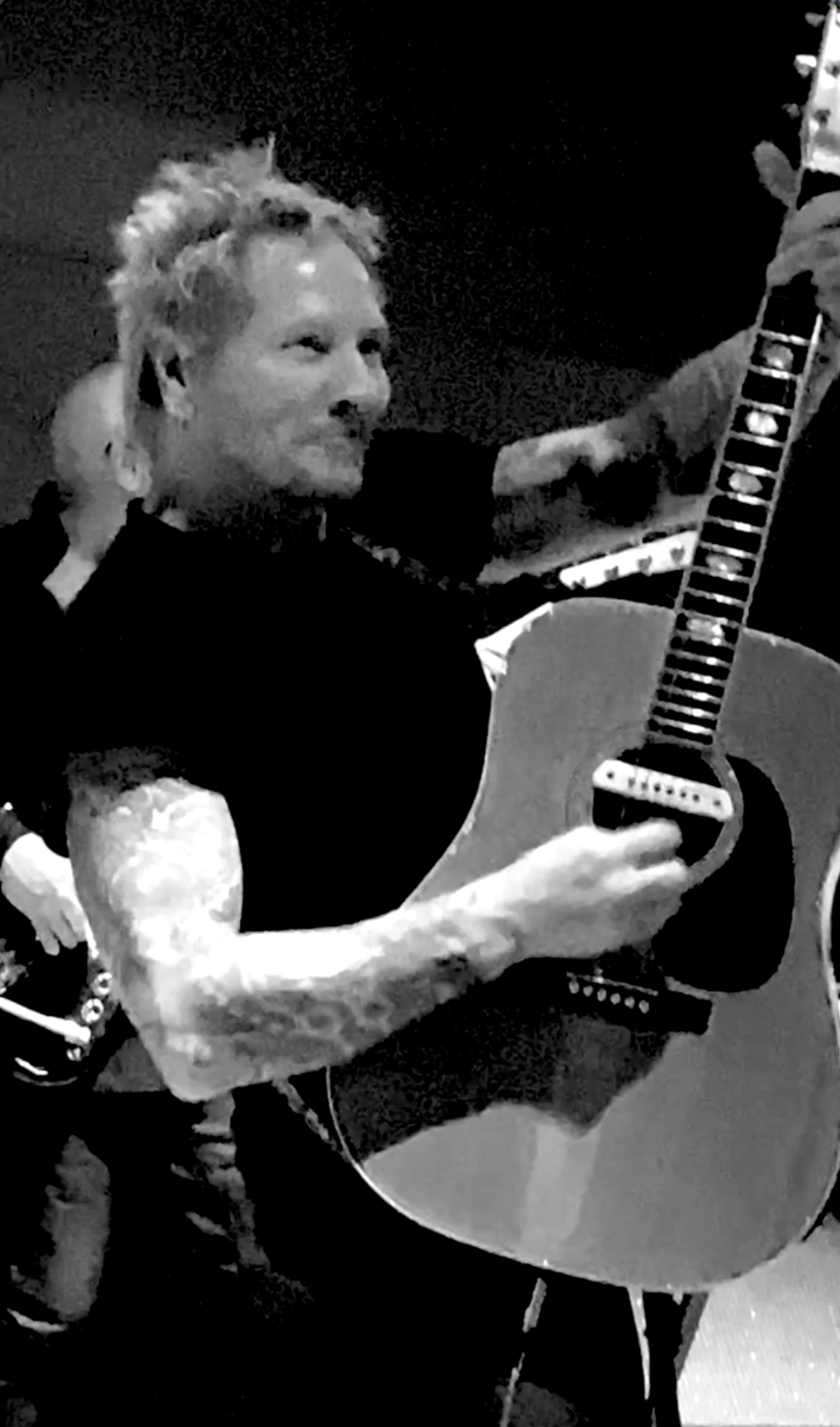 Black and white image still from performance video ATA Holiday Acoustic Jam