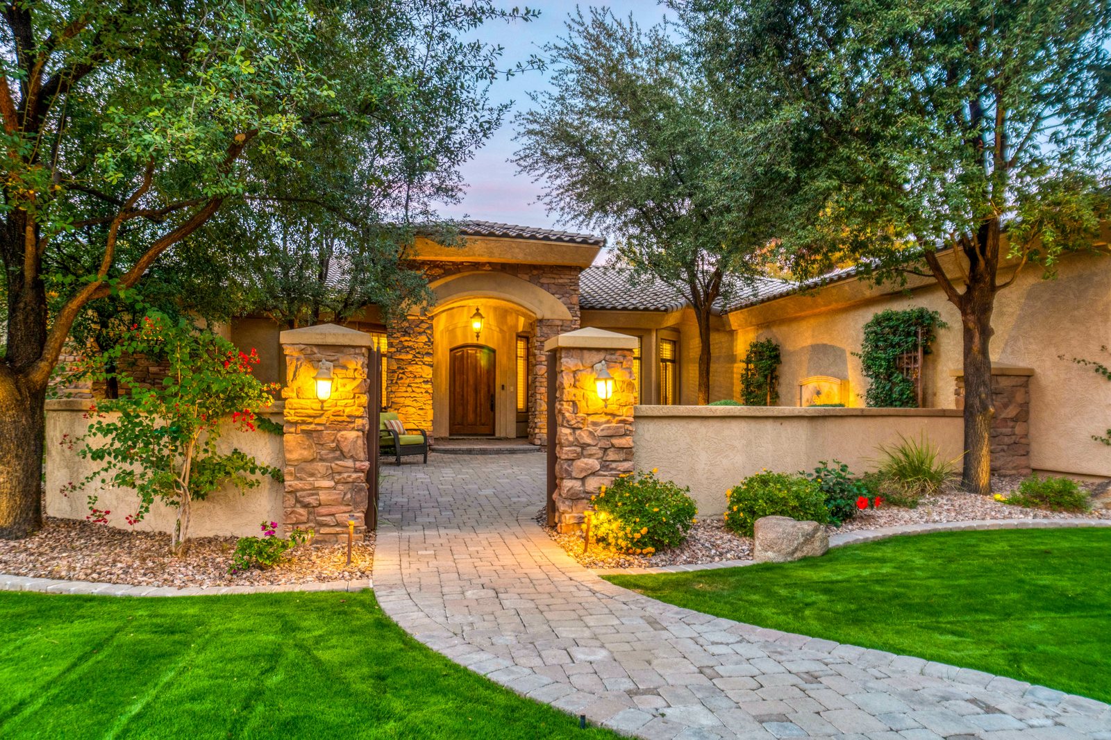 A protected modern home at sunset