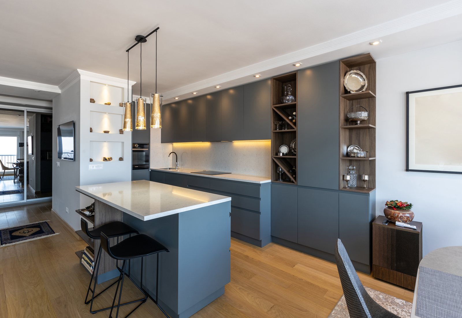 A spotless, sunlit modern kitchen