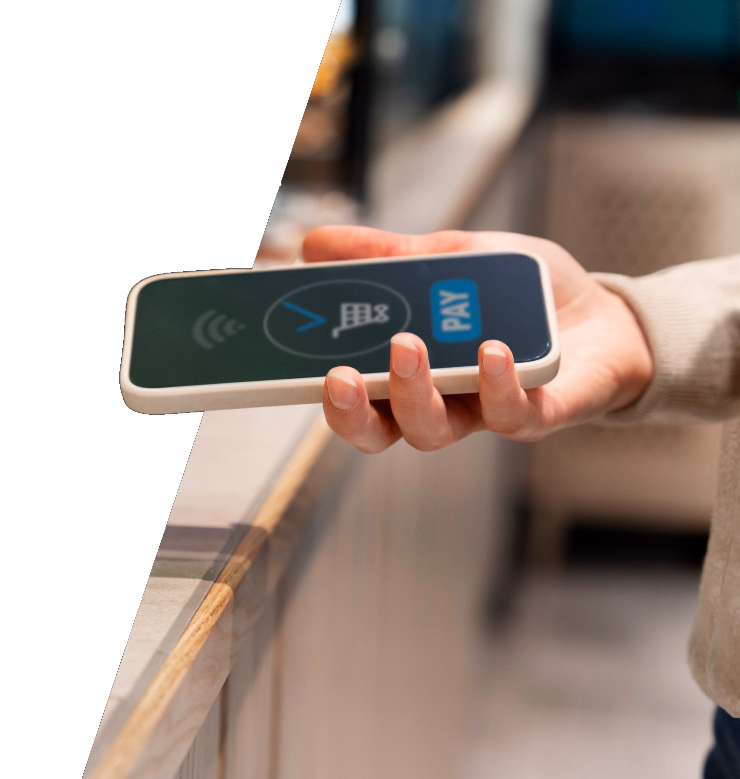 Customer paying with a smartphone at checkout