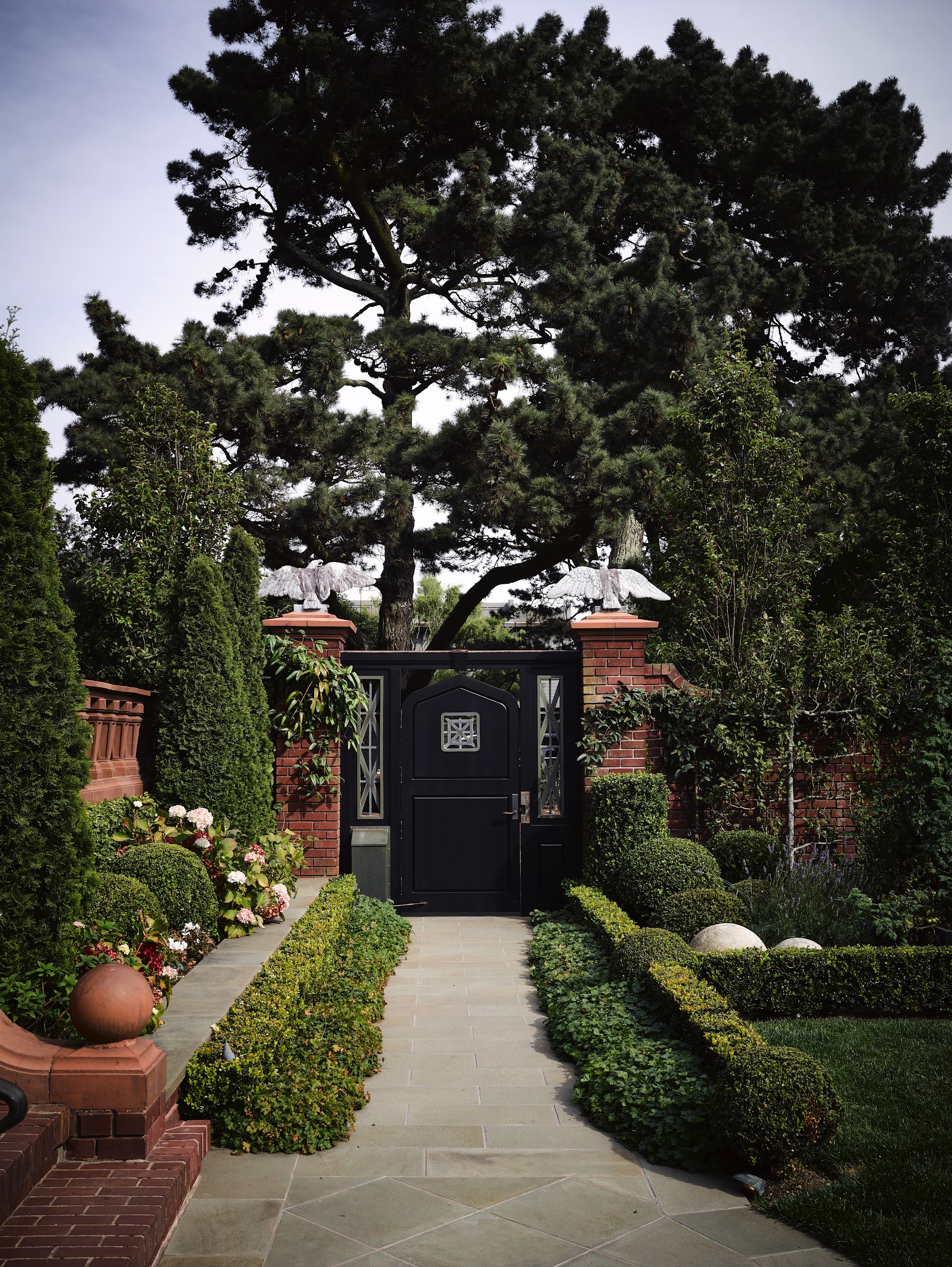 San Francisco Tudor garden entrance by Hillary Thomas