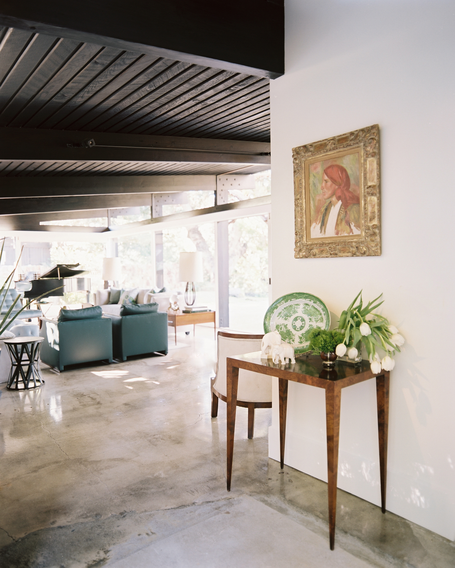 Midcentury Modern Retreat living room with teal sofas by Hillary Thomas