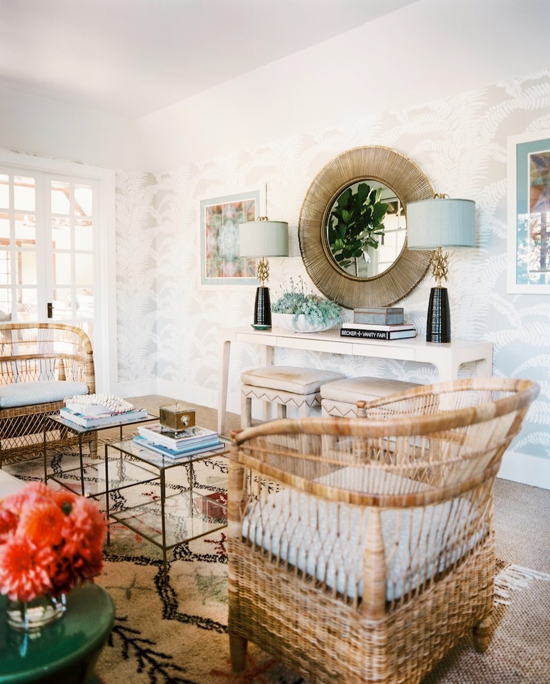 Napa Valley Showhouse sunroom view past rattan chair to the console by Hillary Thomas