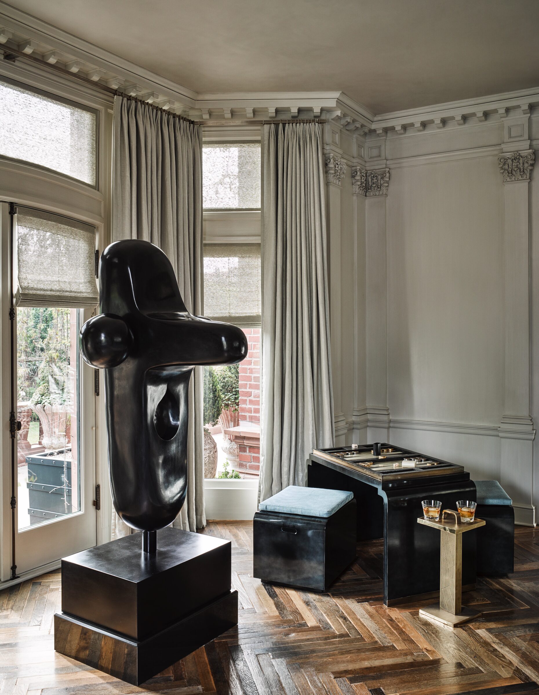 San Francisco Tudor living room bay window with sculpture by Hillary Thomas