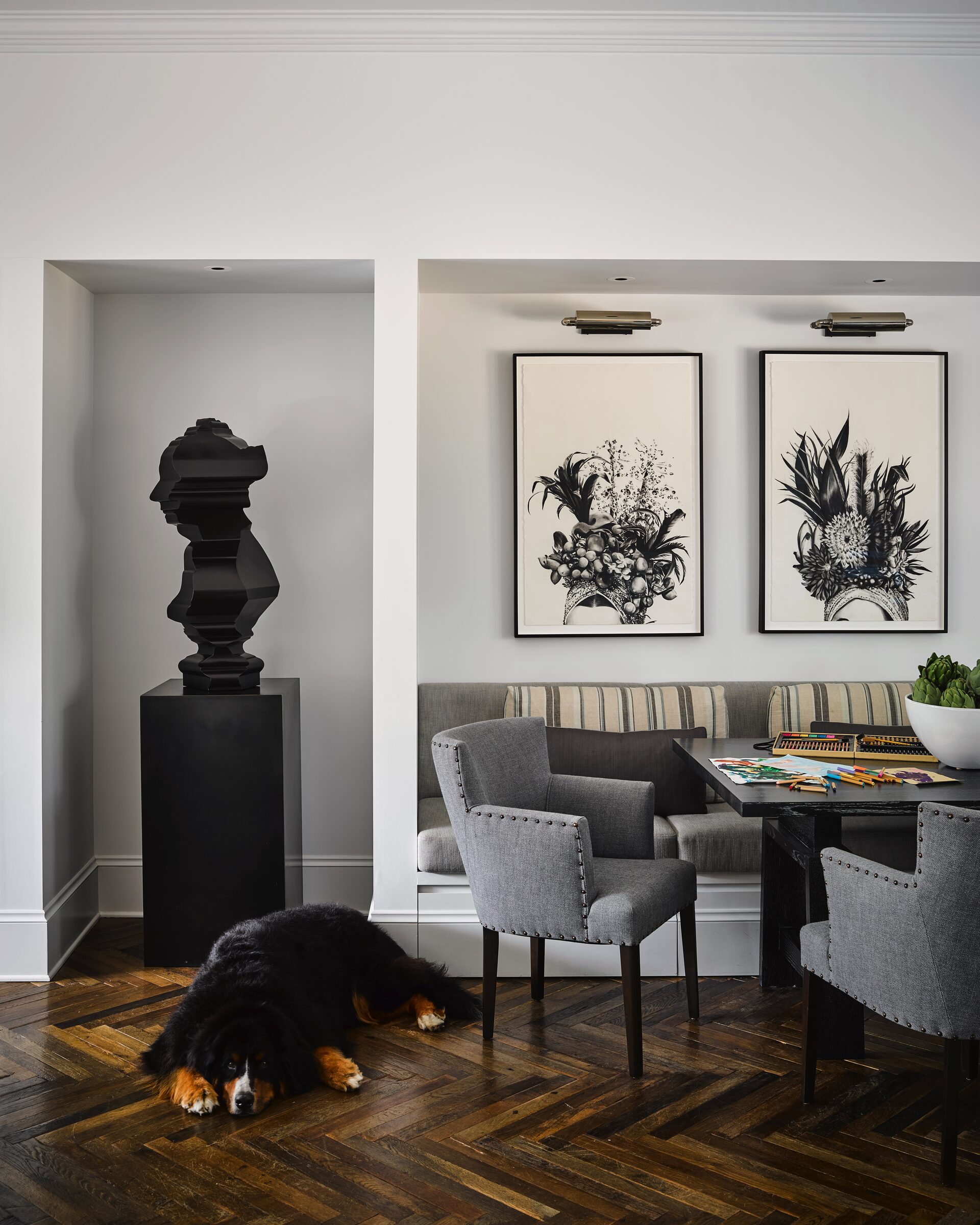 San Francisco Tudor breakfast room with banquette and botanical prints by Hillary Thomas
