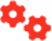 Two red interlocking gears with one smaller gear behind a larger gear.