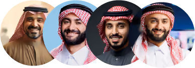 Four men wearing traditional Middle Eastern attire smiling in close-up portraits.