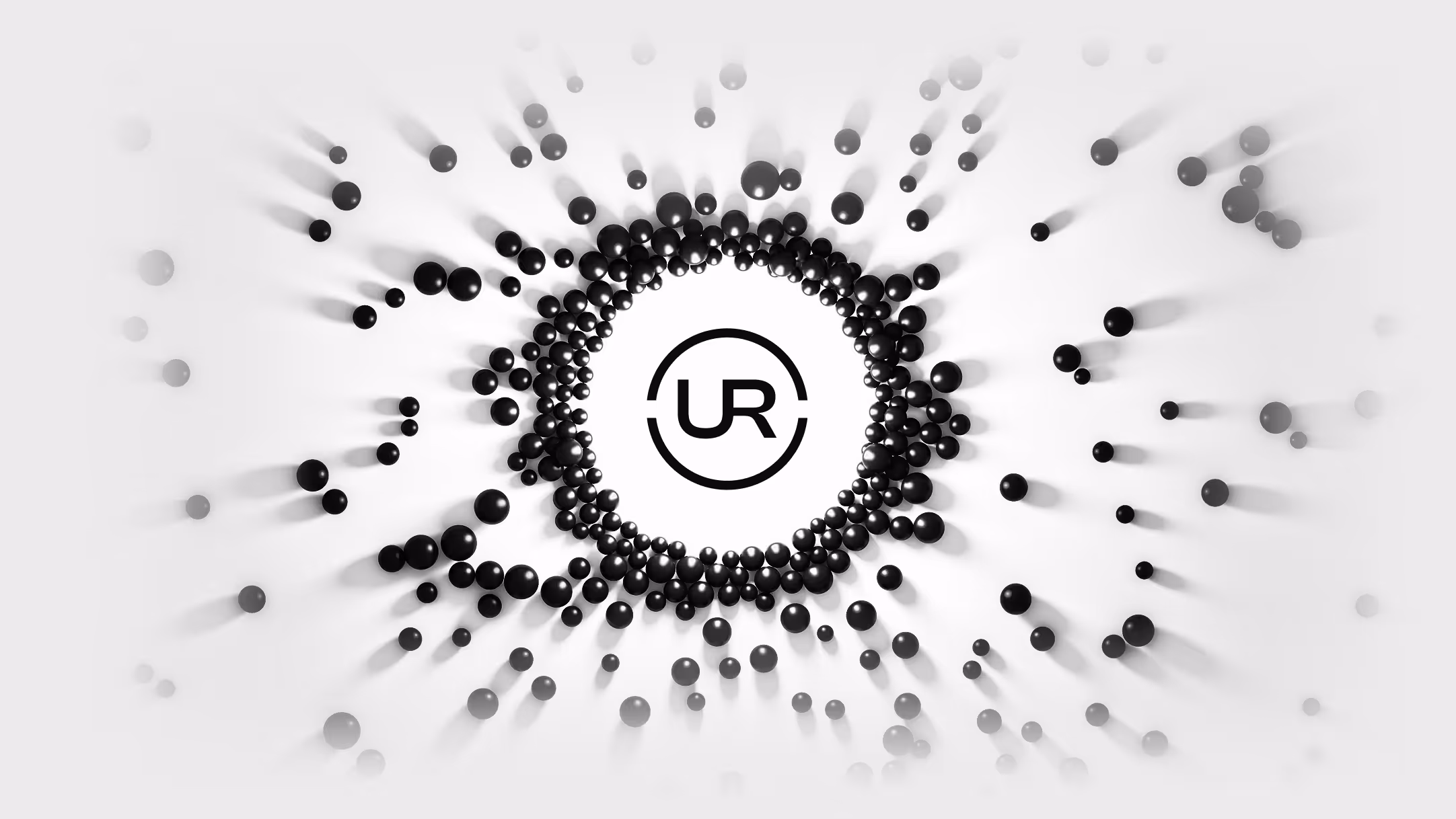 Black spheres arranged in concentric circles around a central 'UR' logo on a white background with shadows.