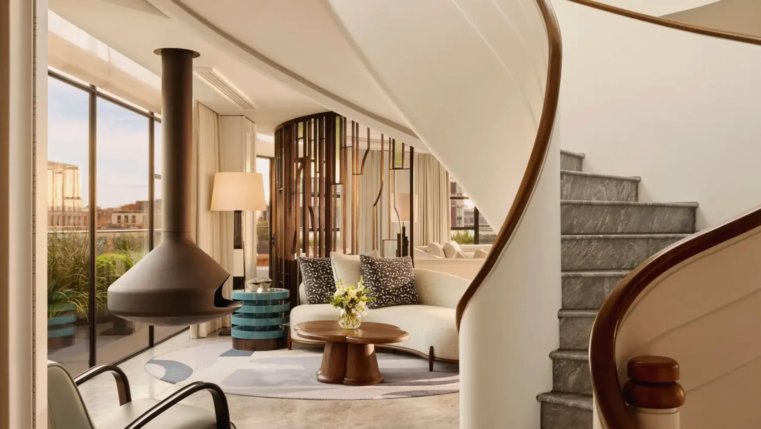 Andre Fu designed suite with suspended Focus Fire by Modus Fireplaces