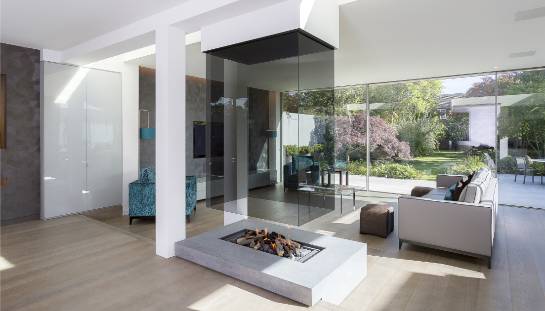 Room dividing bespoke fireplace by Modus Fireplaces 
