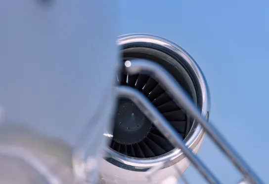Close-up of an airplane jet engine turbine blades 