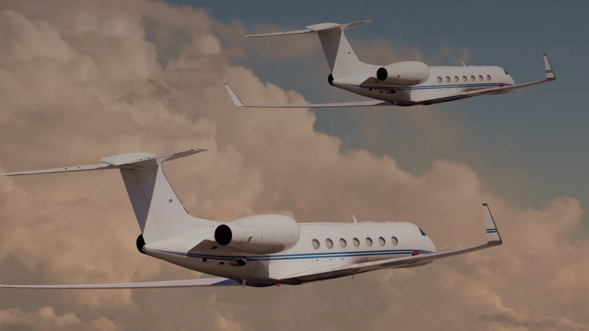 Two white private jets flying in cloudy sky at sunset or sunrise.