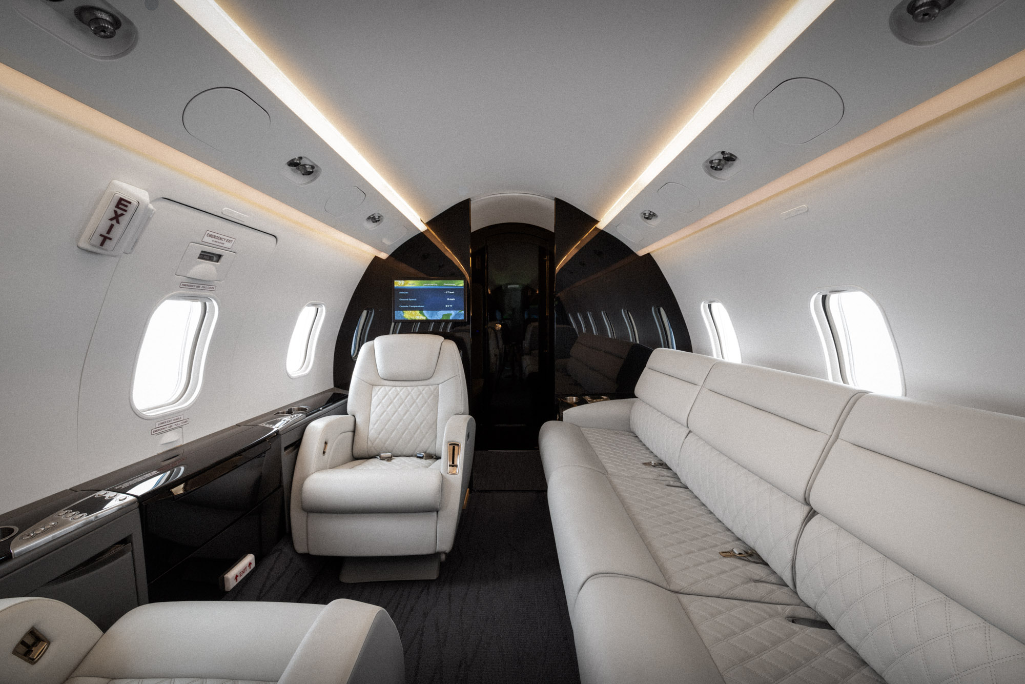 The back club of a Challenger 350 private jet.