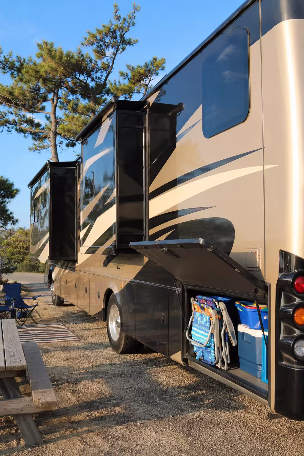 Class A motorhome with open storage at an Outer Banks campground