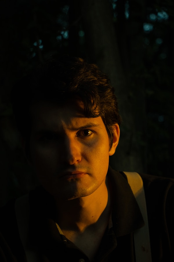 Man with dark shadows on his face