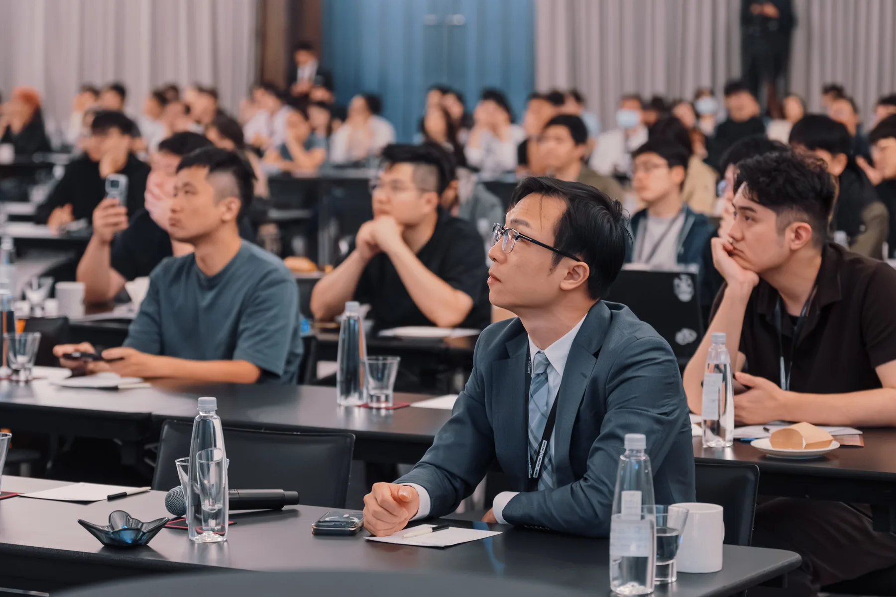 Participants listening during a dental education course