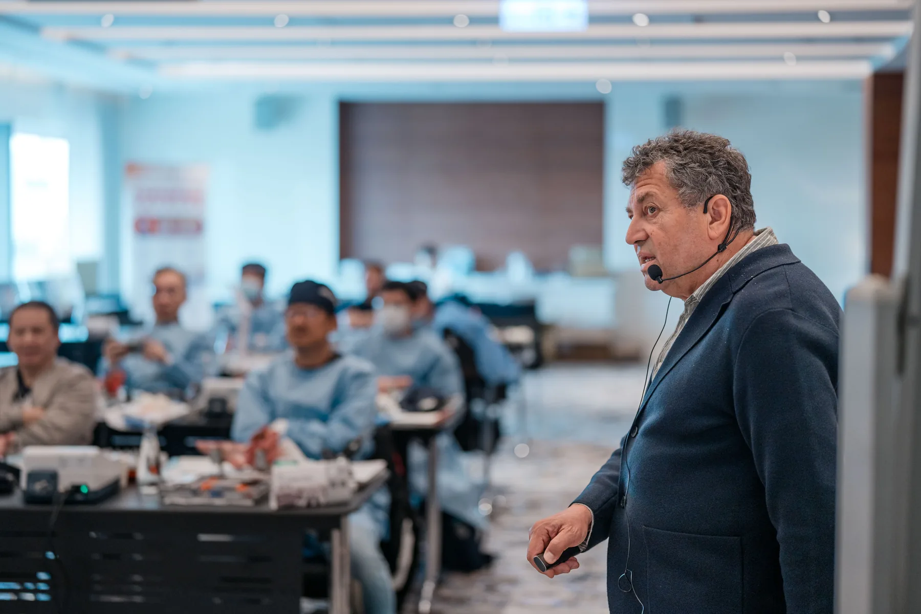 An instructor discusses a case with participants