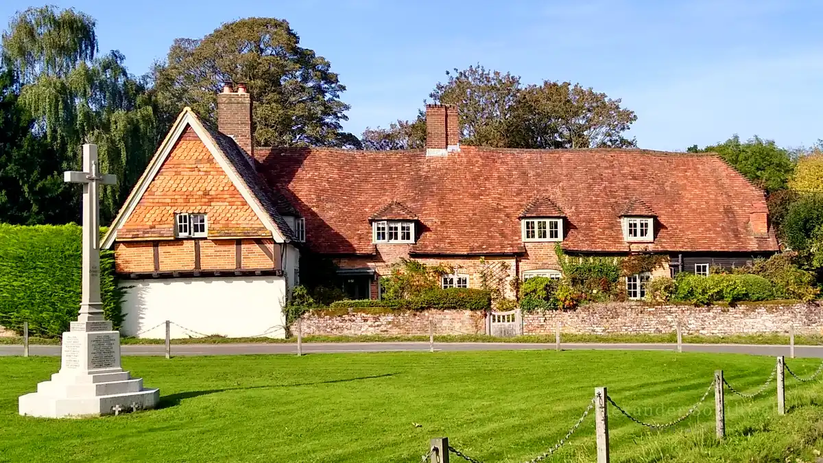 Timber framed cottages beside the village green at East End in the Basingstoke and Deane area