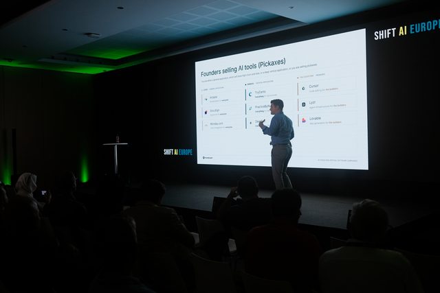 A founder presenting on the main stage at Shift AI Europe 2026