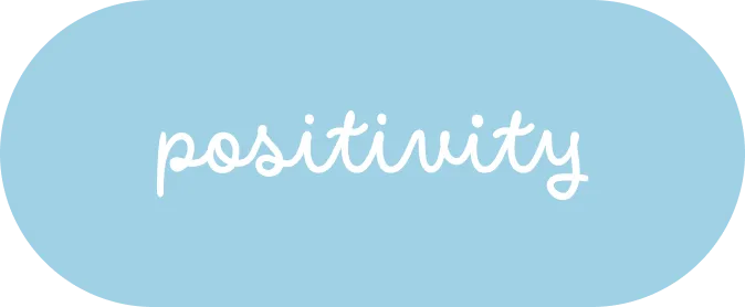 The word 'positivity' written in white cursive text on a light blue oval background.