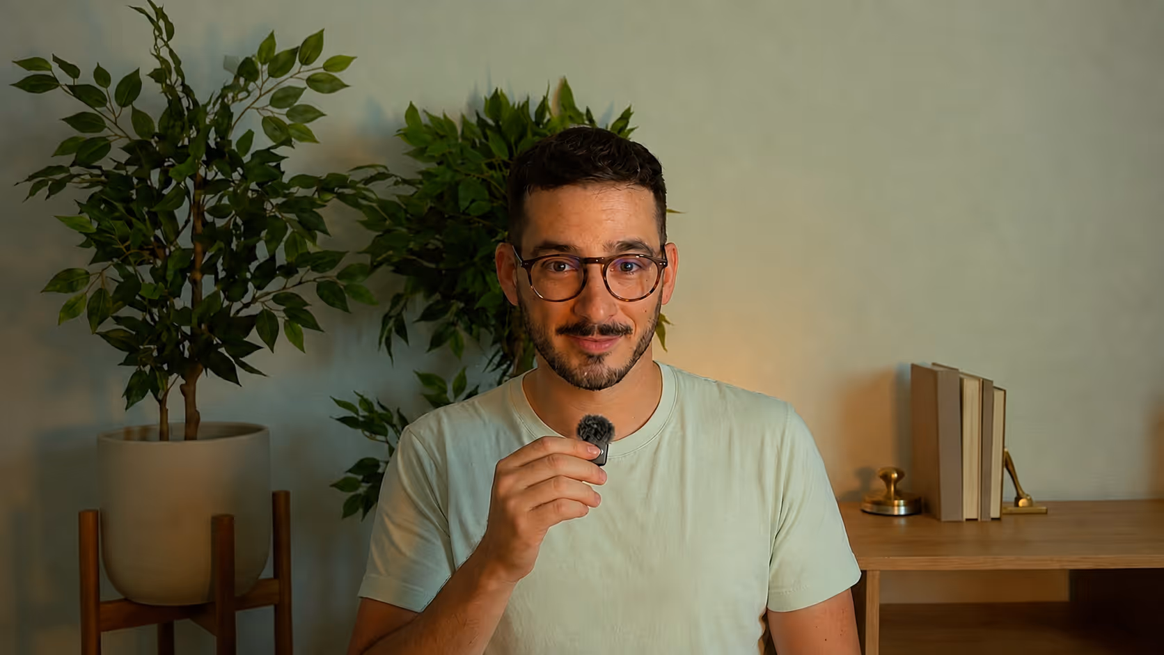 A man standing in the middle of a dark room.