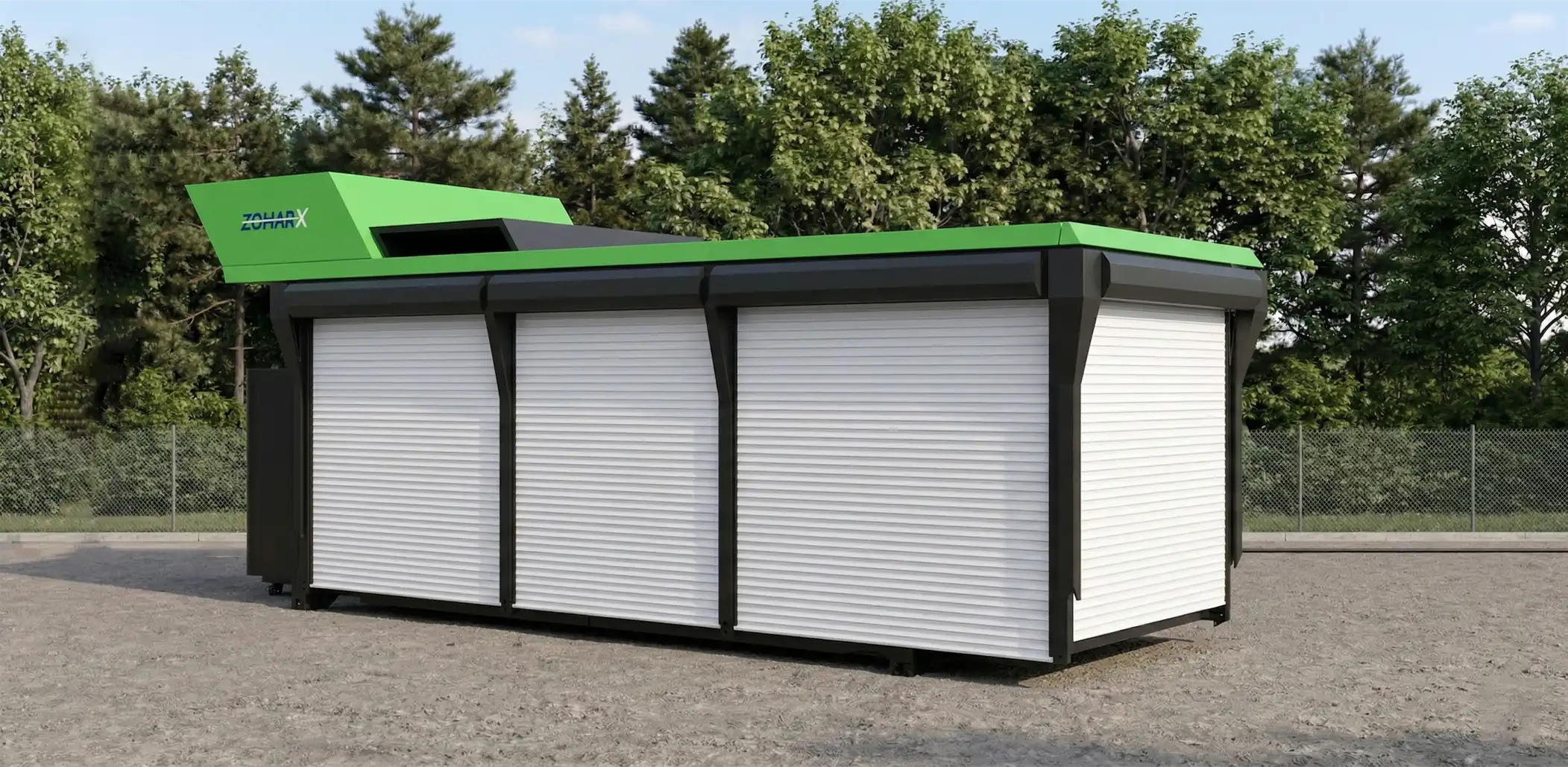 Large green and black industrial machine with 'Zohar X' branding and three white roll-up doors, set outdoors on gravel with trees in the background.