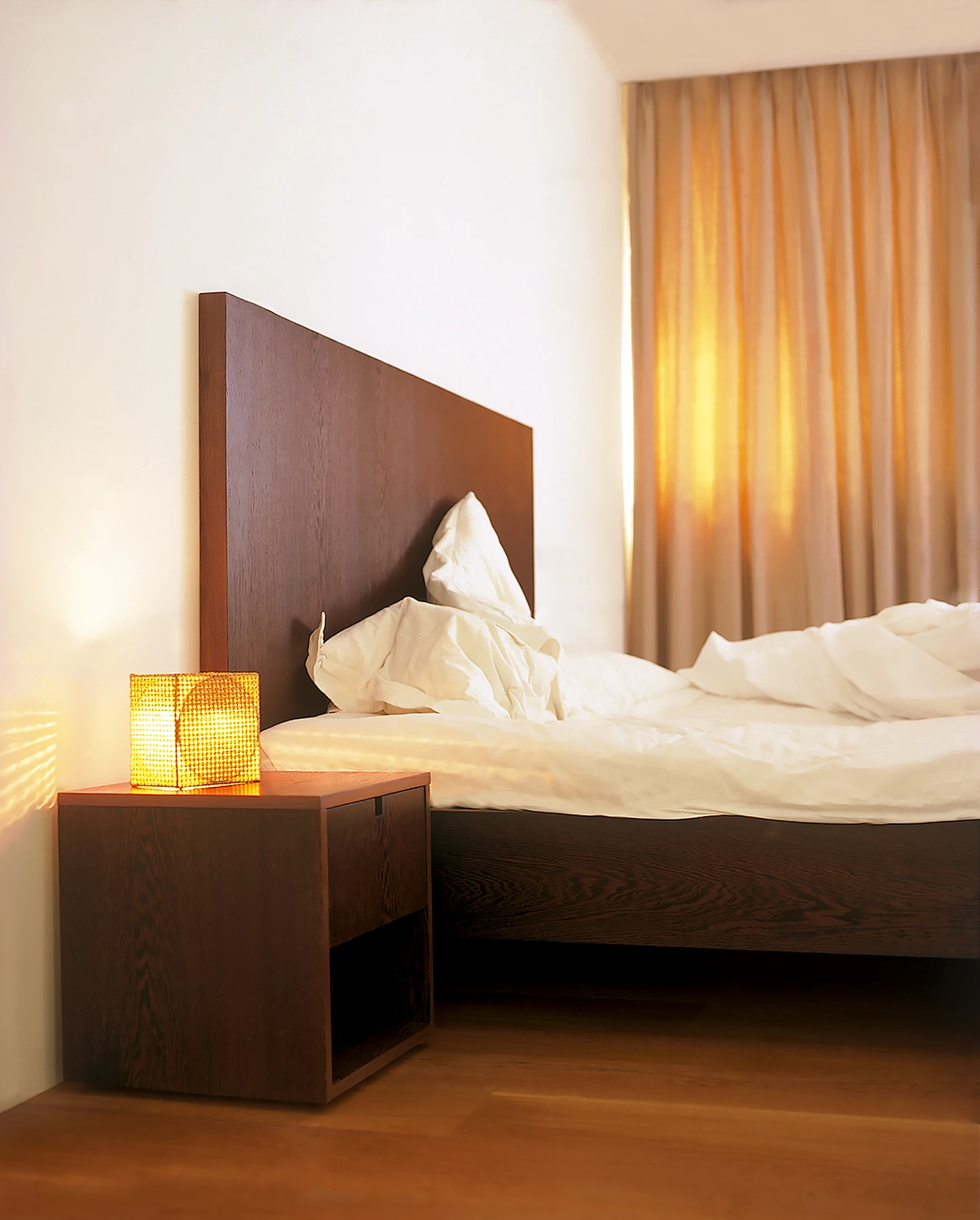 Bespoke Wenge bed, loose furniture and lighting.