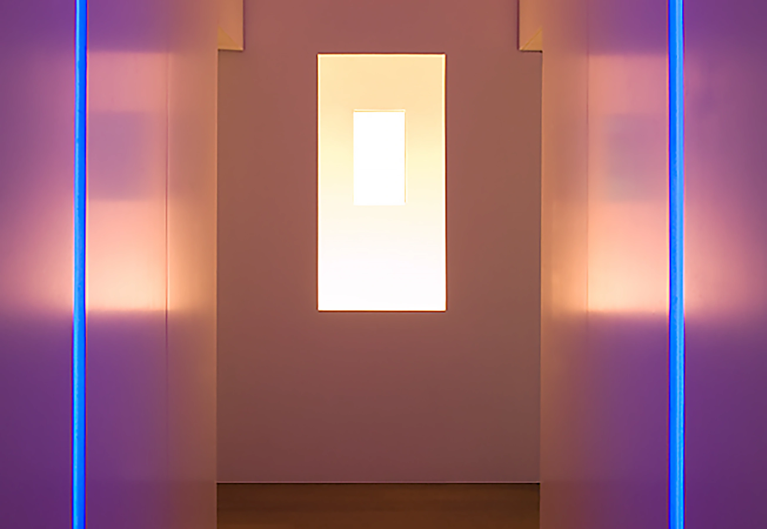 Entrance with lights tuned to Yves Klein blue