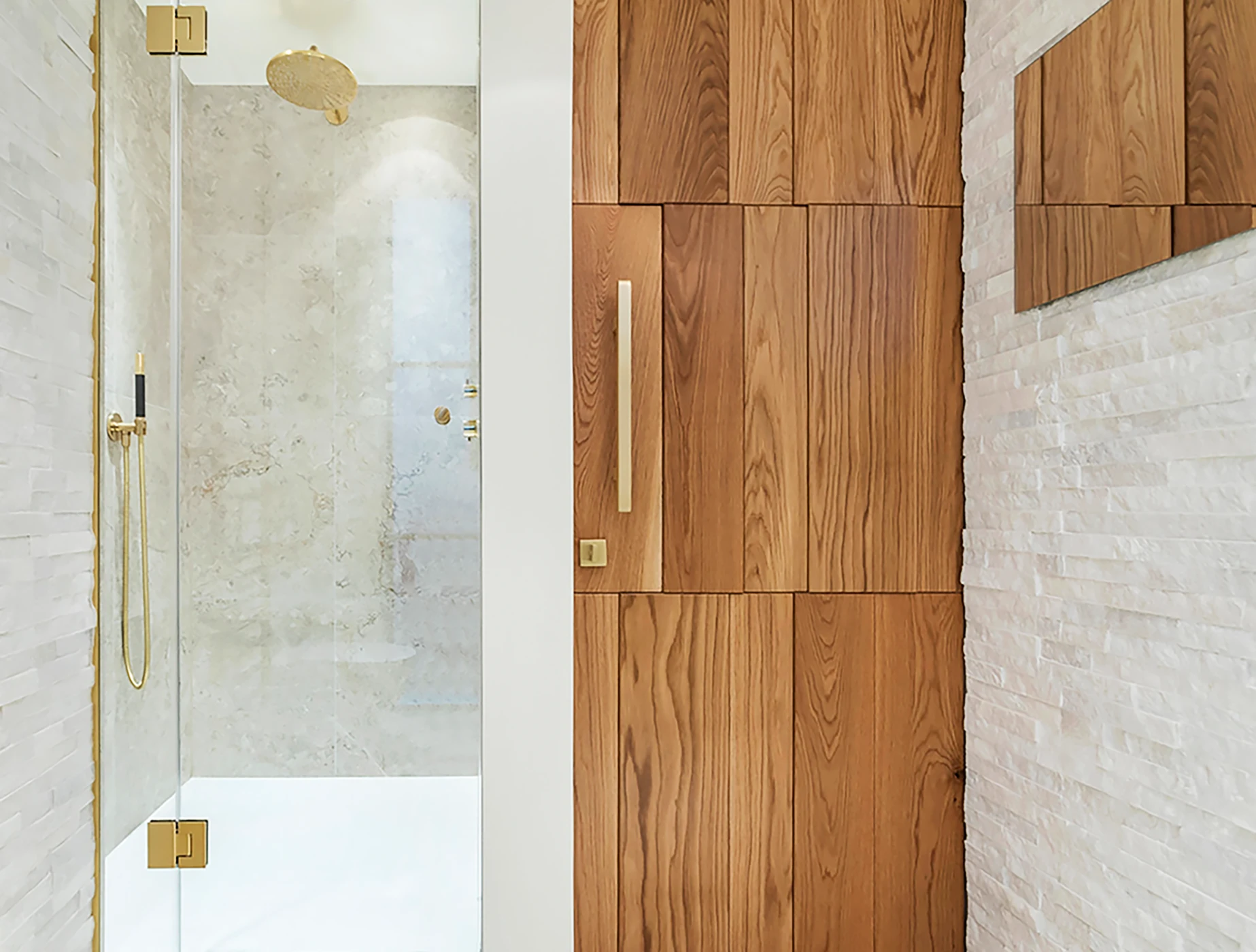 Bathroom with bespoke floor-to-ceiling oak doors.