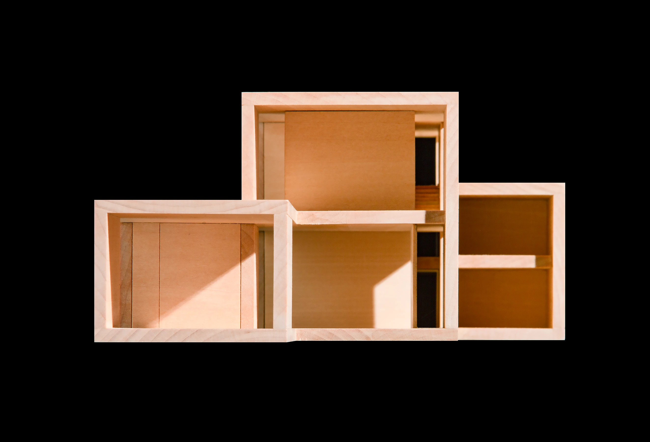 Model viewed from the garden, where smaller domestic-scale rooms face private terraces.