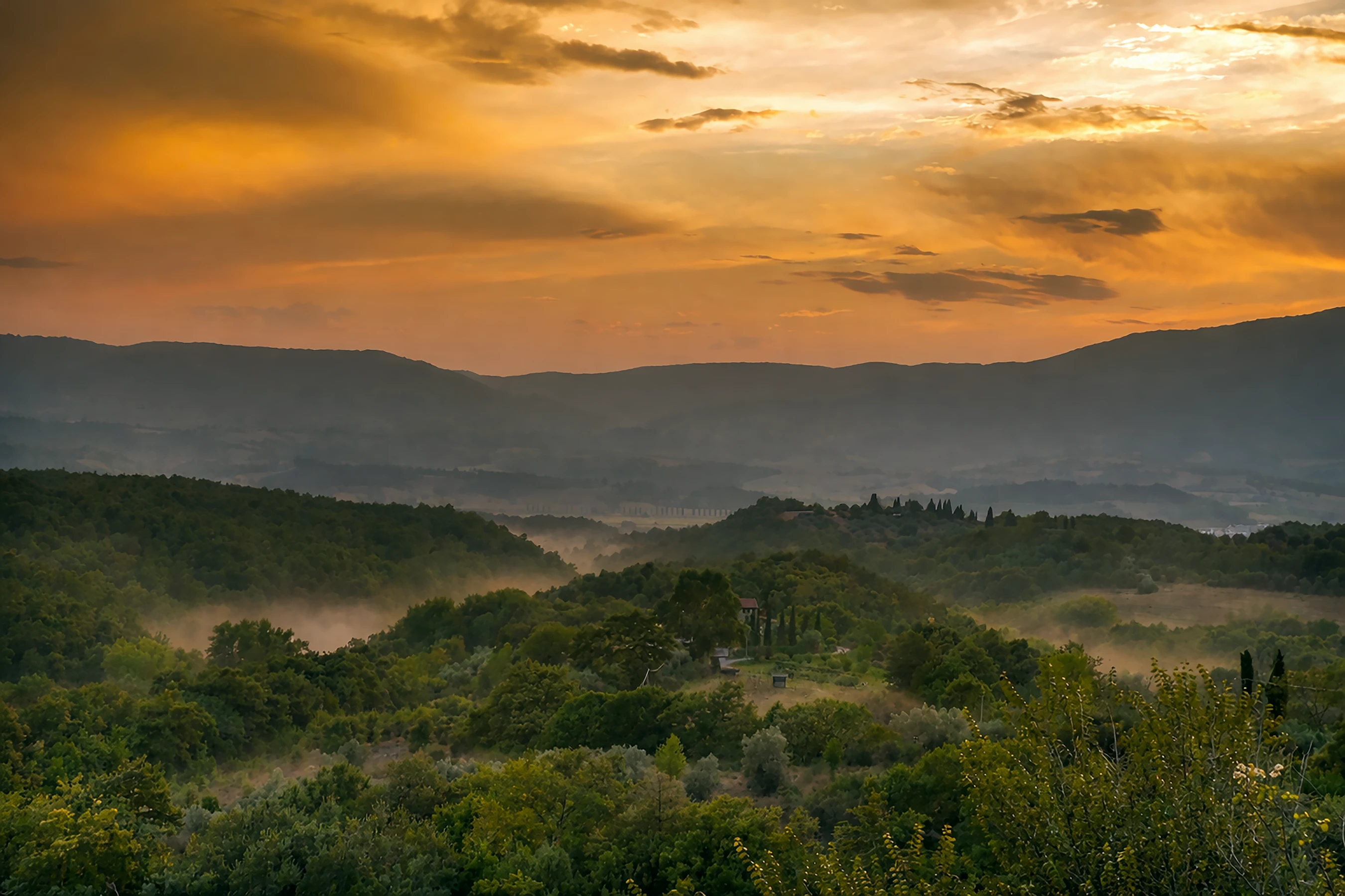 Views from the main reception and bedroom down the hill to the sunset.