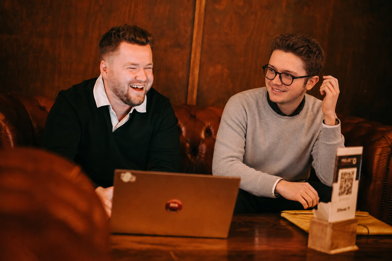 Two steerio colleagues working together at a laptop