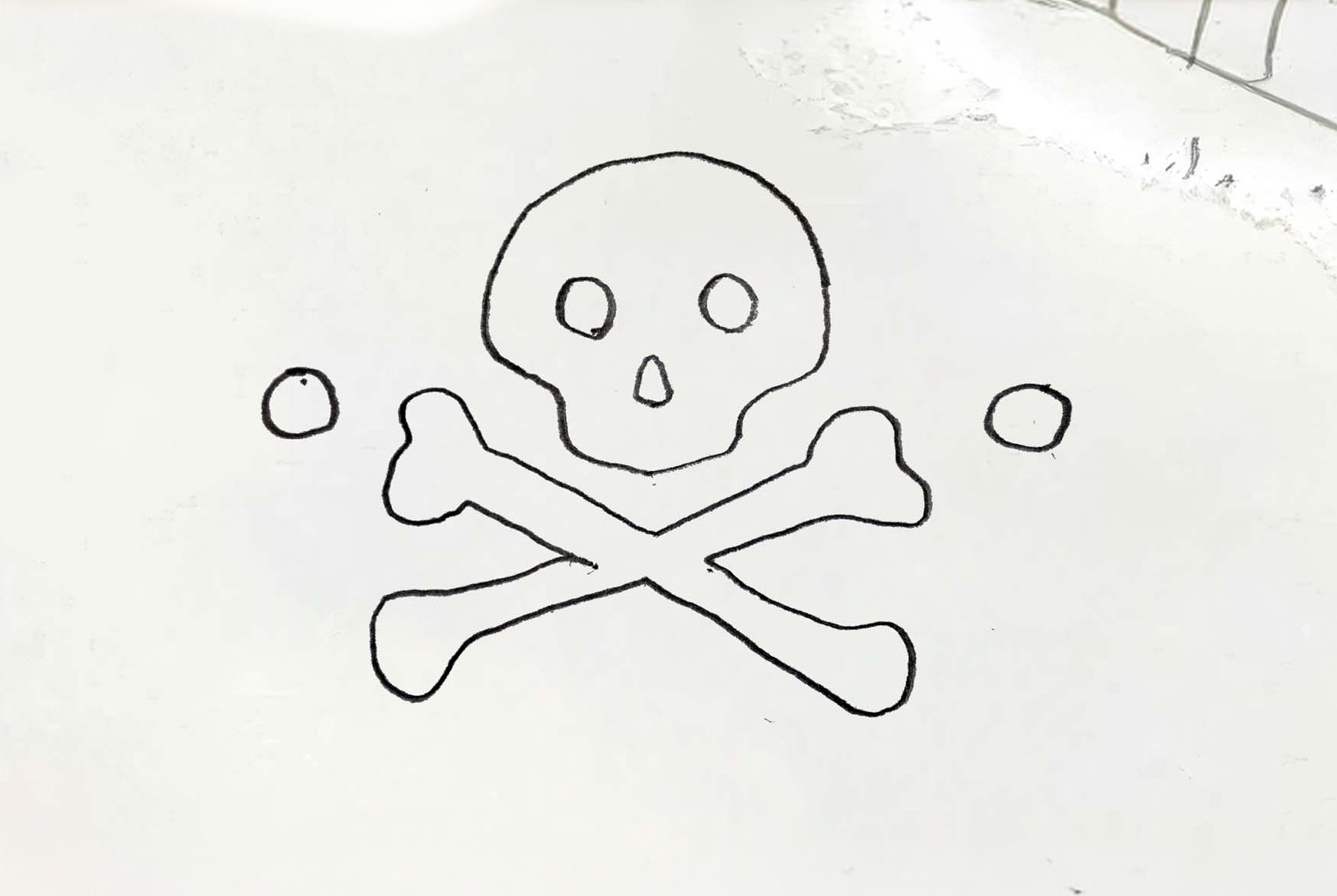 J. James skull and crossbones logo sketch