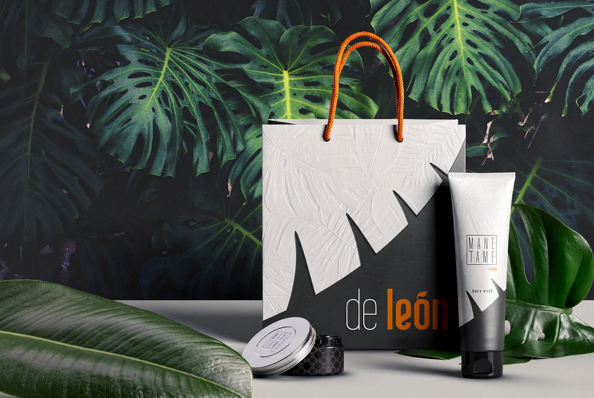 Mane Tame retail bag with embossed leaf and orange cord