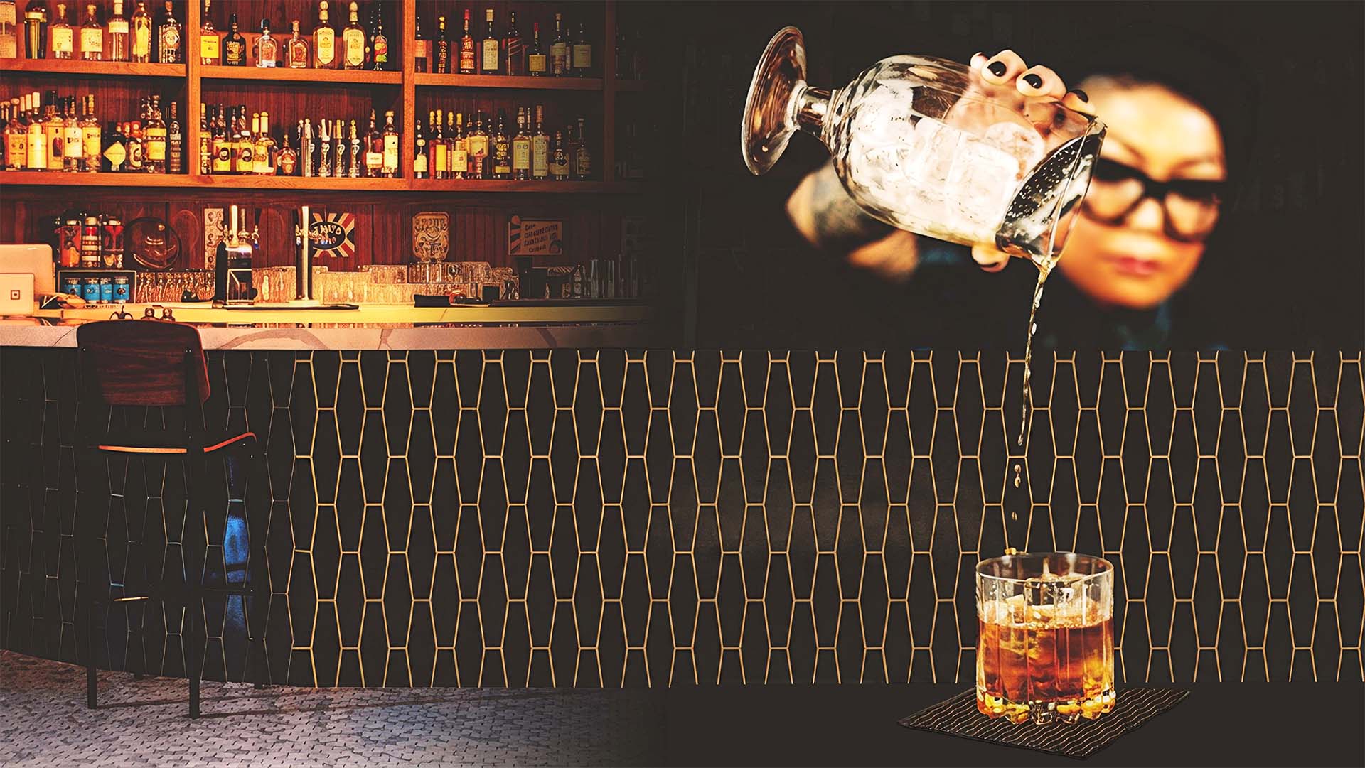The Anguished Barber bar with branded gold tile pattern