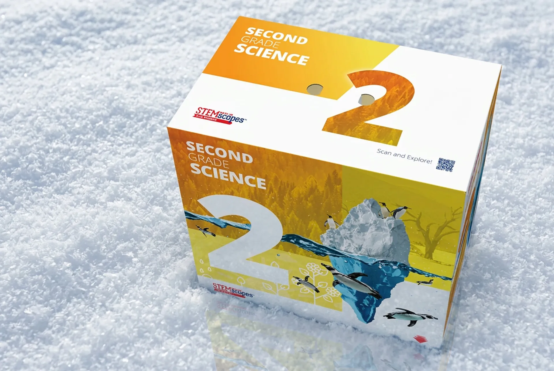 The Oregon NGSS second grade science kit box standing on snow, a large numeral 2 over an iceberg and penguin illustration