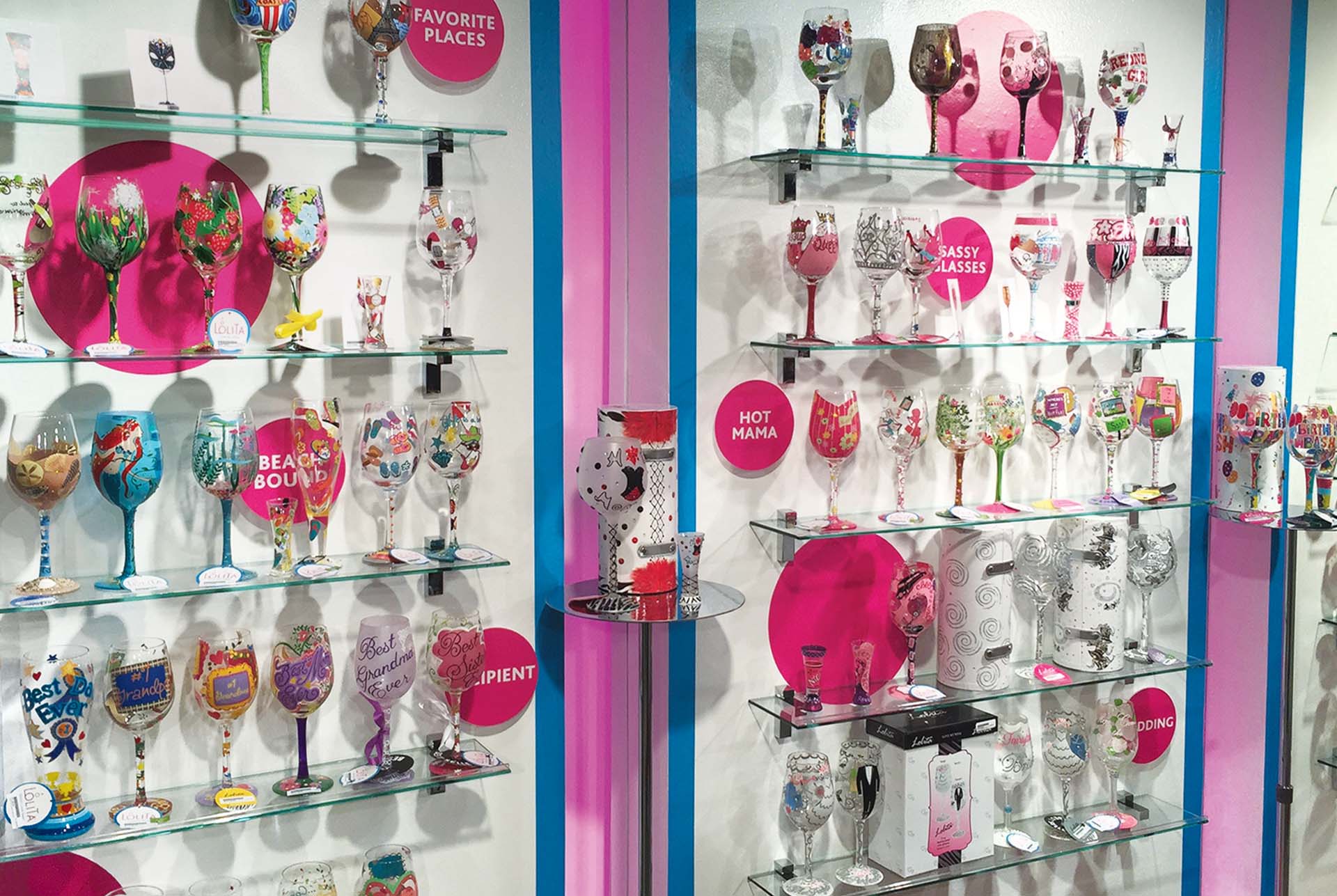Designs by Lolita retail wall display of painted glasses