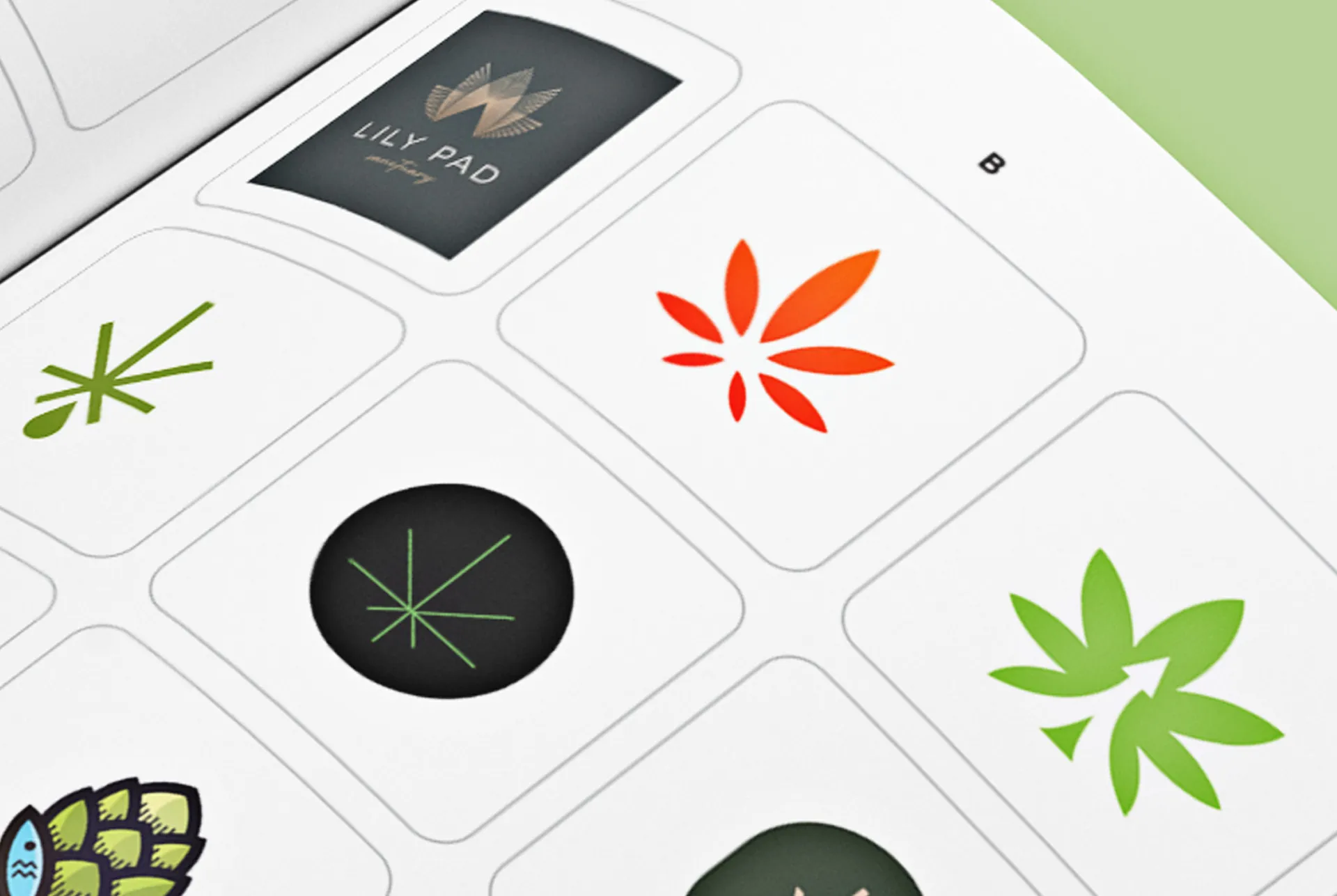 The BTA cannabis leaf mark printed in the LogoLounge annual, shown in the book's logo grid