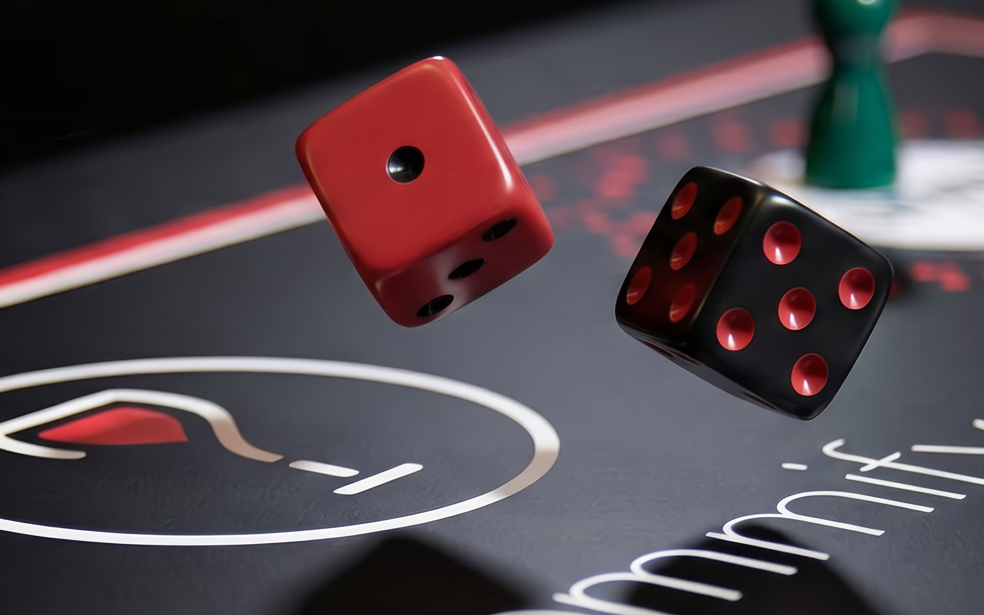 Two red Sommify dice coming to rest on the printed board beside a green pawn
