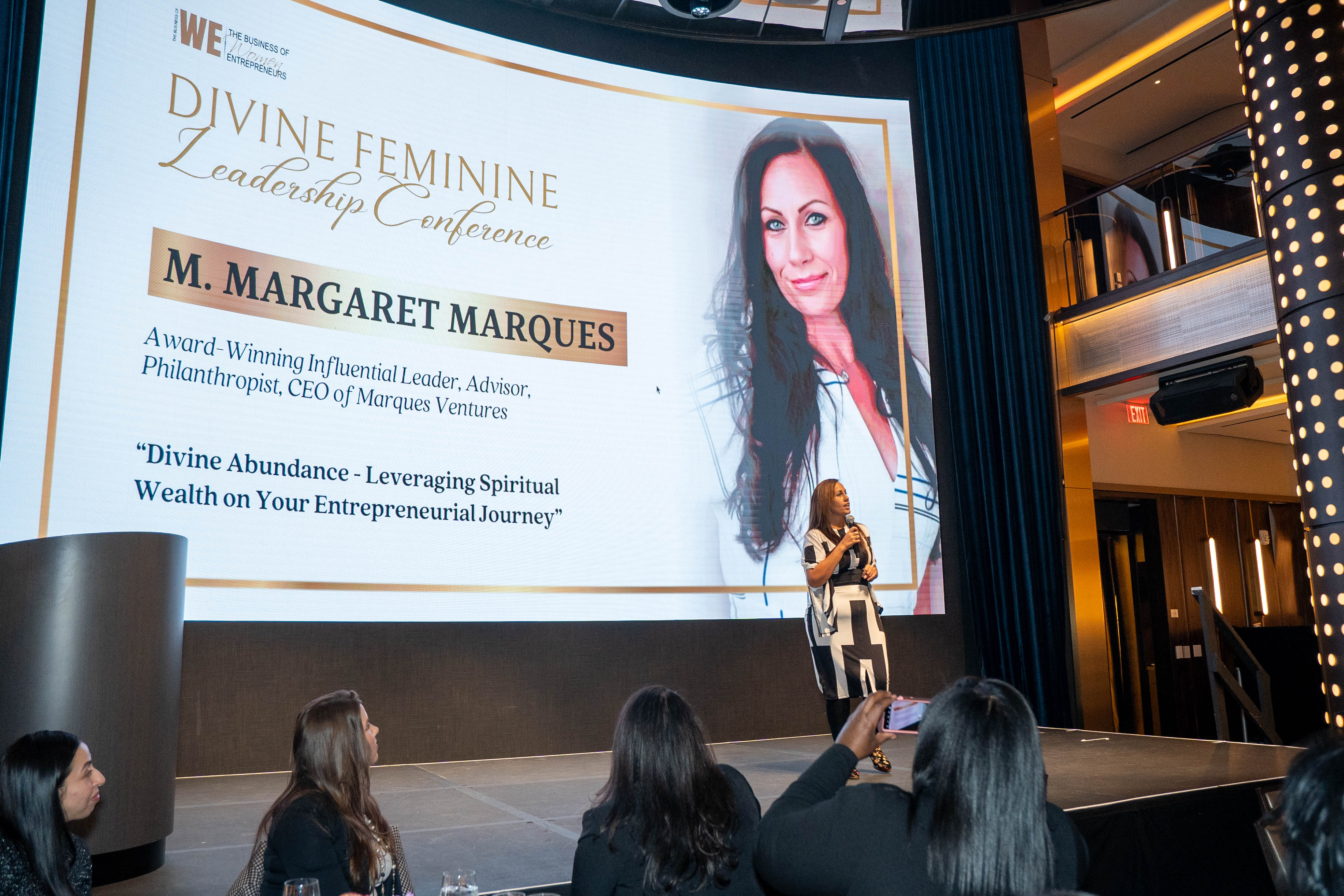 Michelle Margaret Marques on stage in NYC