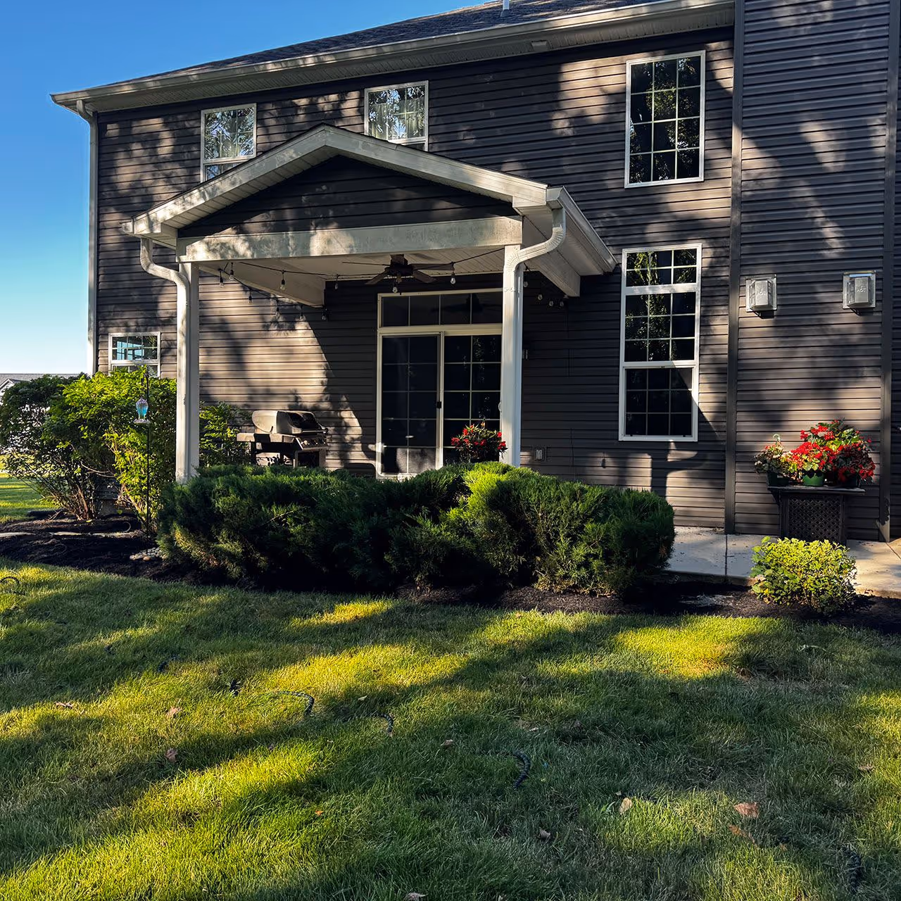 Professional lawn care service with thick green grass and clean finish