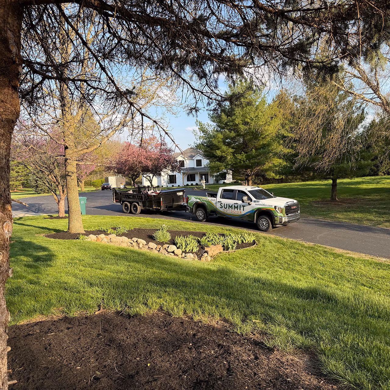 Outdoor service team maintaining residential property