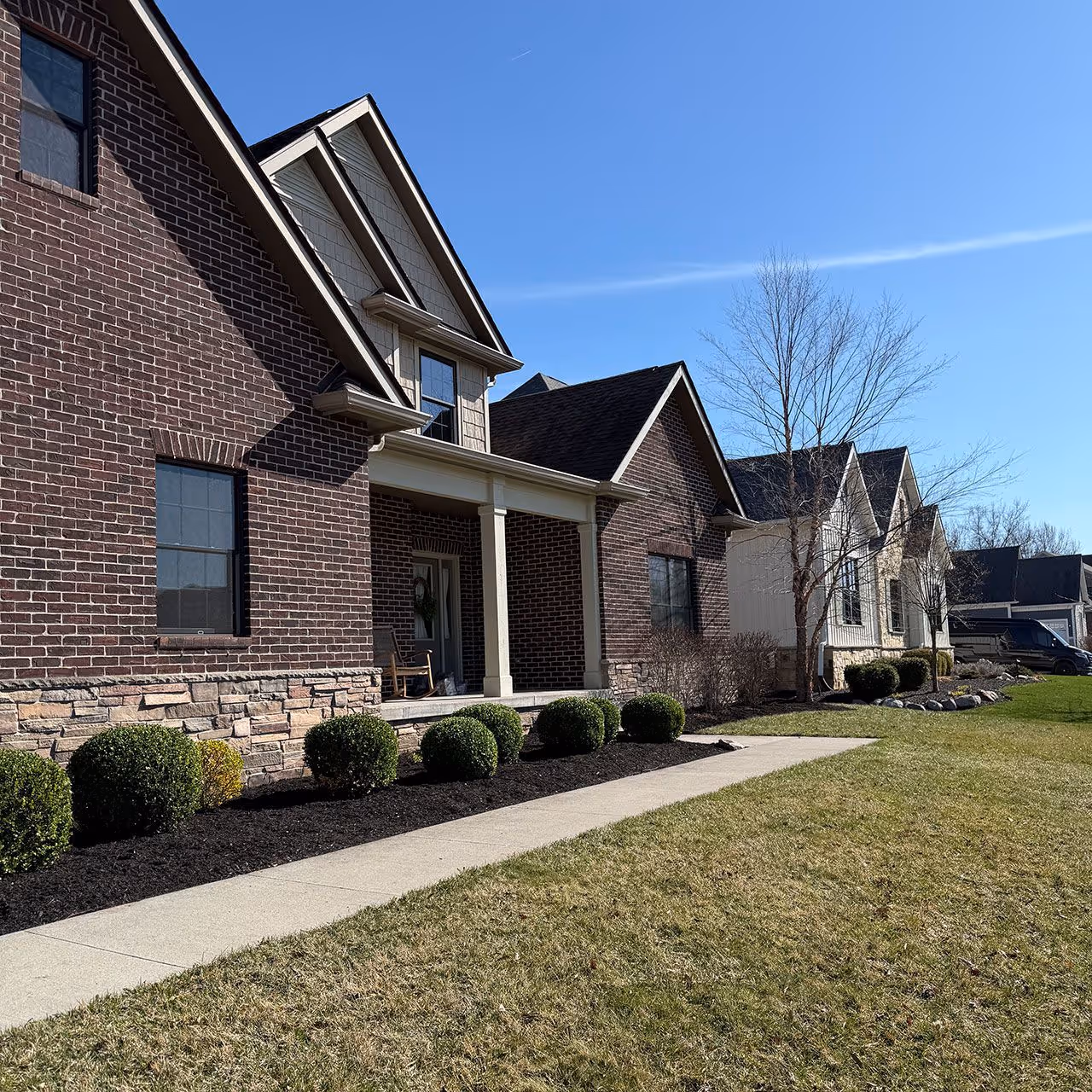 Front yard landscape transformation with clean bed edges