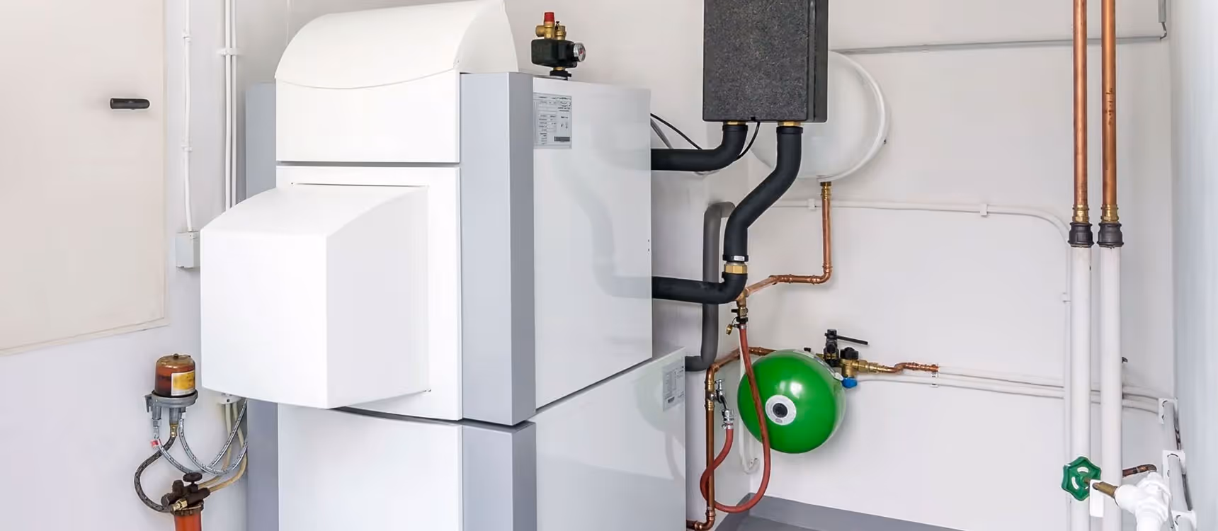 White fuel oil boiler system inside home