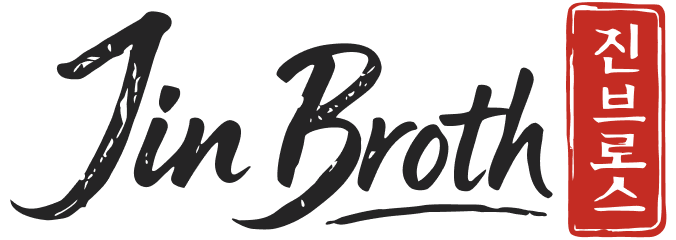 Jin Broth brand name in cursive black font beside a vertical red rectangle with Korean characters.