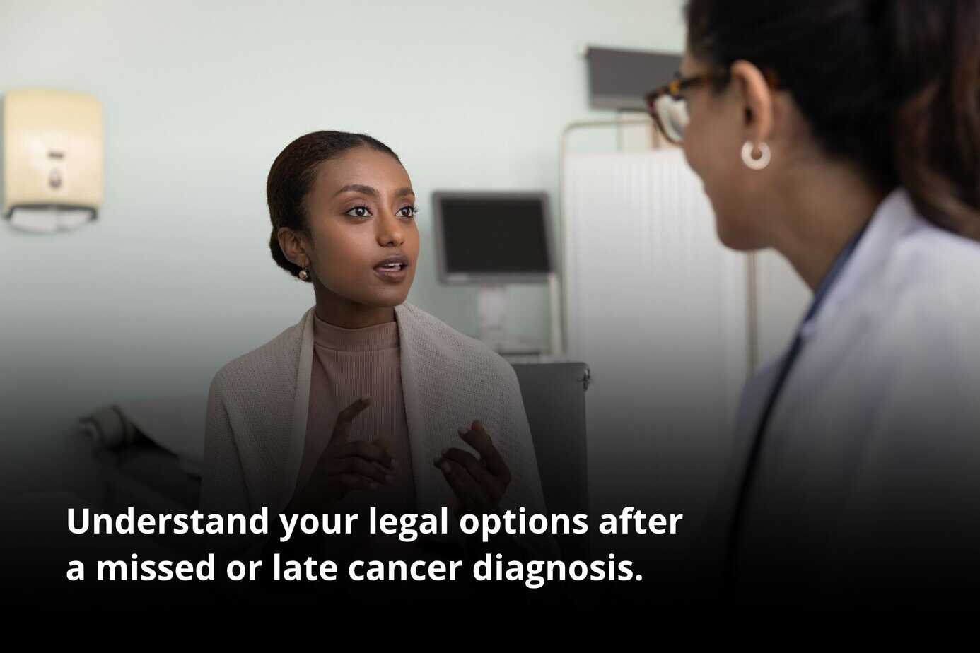 Woman at medical visit, representing the need for an Orange County cancer misdiagnosis attorney.